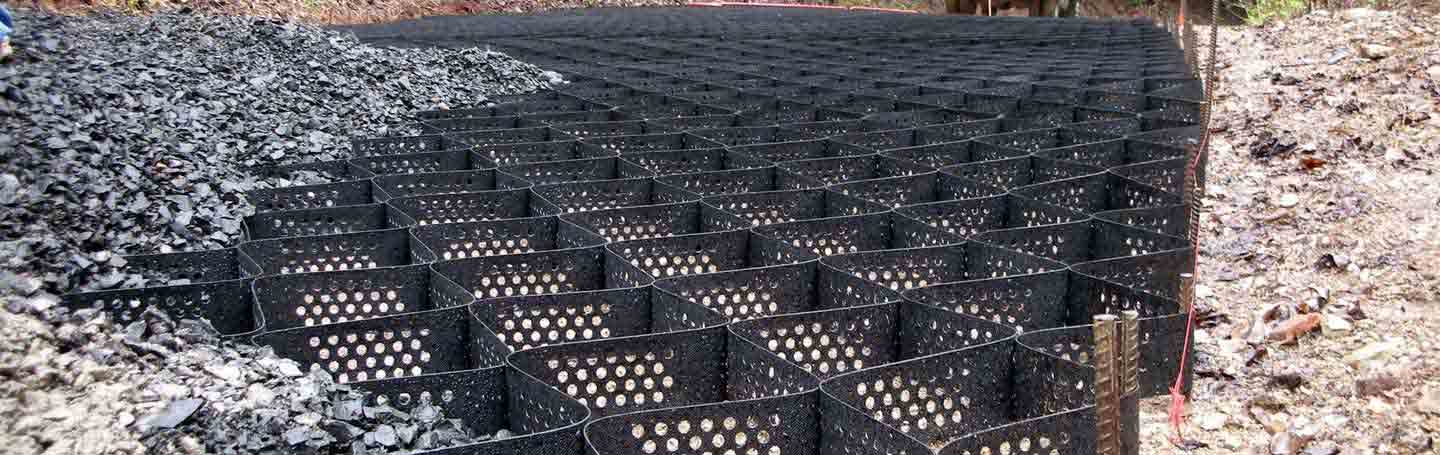 Армирование дорожного полотна георешеткой